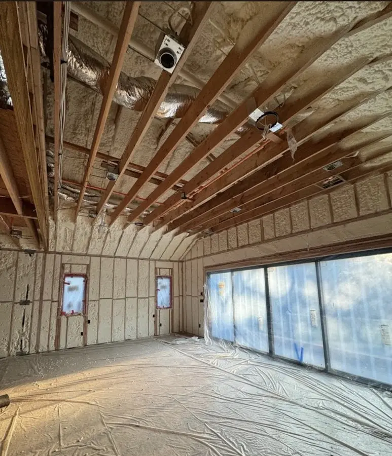 Interior walls and ceiling insulated with spray foam during new construction in Aurora
